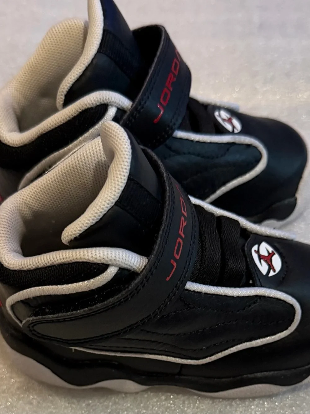 Jordan Kids Black and Red High-Top Sneakers with White Trim size 6C